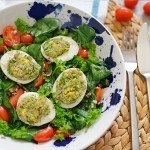 Stuffed Eggs on Spinach